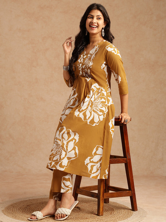 Mustard Floral Print A-Line Cotton Stitched Kurta Set