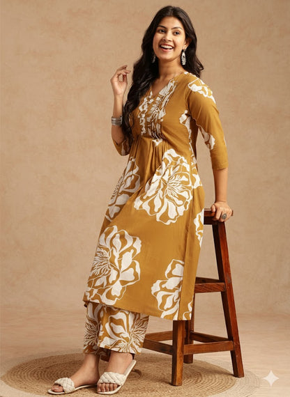 Mustard Floral Print A-Line Cotton Stitched Kurta Set